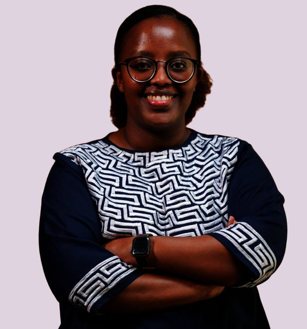 Esther Kunda wearing a blue shirt with white patterns